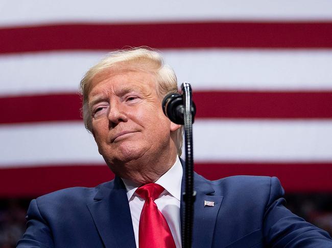 (FILES) In this file photo taken on March 02, 2020 US President Donald Trump speaks during a rally at Bojangles' Coliseum in Charlotte, North Carolina. - US President Donald Trump said on June 10, 2020, he will restart rallies in Oklahoma, Florida, Arizona, North Carolina. (Photo by Brendan Smialowski / AFP)