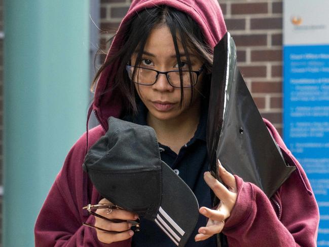 ST GEORGE SHIRE STANDARD. Ngan Vy Bui, 18, from Ryde, was charged with commercial prohibited drug supply after she allegedly attempted to smuggle 1000 caps inside her bra into Epik Music Festival in Sydney. Photographed today 14th of January 2020 leaving Burwood Court.  (AAP/Image Matthew Vasilescu)