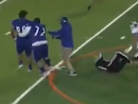 A high school footballer put a massive body slam on the referee.