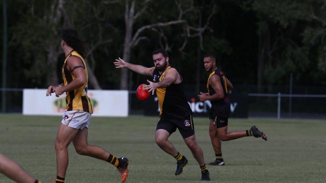 North Cairns Tigers Dillon Rogers kicks the ball against the Manunda Hawks at Watsons Oval. Picture: Harry Murtough