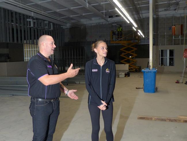 Planet Fitness Mundingburra general manager Gavin Close, left, and  assistant general manager Jordan Rosa inspect the fitout of the new gym, set to open in August. Picture: Blair Jackson