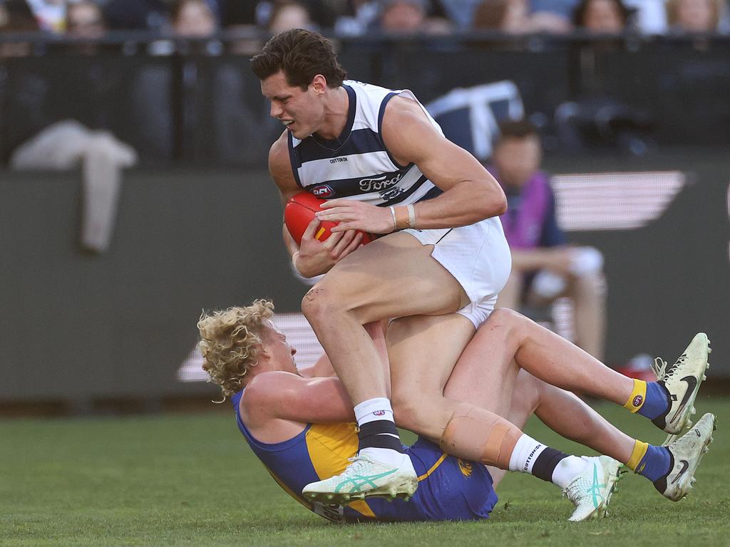 Shannon Neale of the Cats and Reuben Ginbey of the Eagles collide. Picture: Kelly Defina/Getty Images