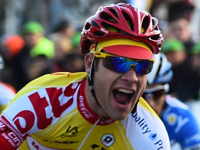 (FILES) This file photo taken on February 1, 2015 shows Belgian cyclist Antoine Demoitie crossing the finish line for the 36th "Grand Prix de la Marseillaise" cycling race on February in Marseille, southeastern France. Belgian cyclist Antoine Demoitie, 25, died after he was struck by a motorbike following a fall during the Gent-Wevelgem race in Belgium on March 27, 2016, police said. / AFP PHOTO / ANNE-CHRISTINE POUJOULAT