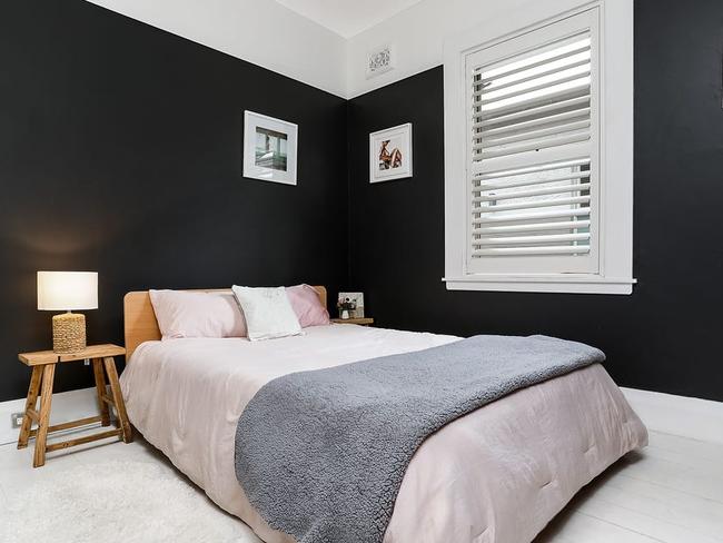 Her Cox Ave home had a distinctive, black-painted bedroom.