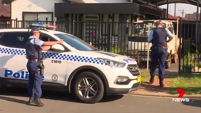 Police at the scene of the shooting in Canley Vale yesterday. Picture: Ch 7