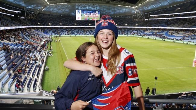 Sisters Georgia Umpleby, 10, (left) and Holly, 12, excited for the first event at the new stadium.