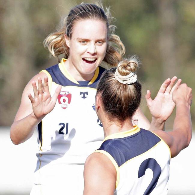 Jess Maher celebrates one of her two goals for Bond University. Pic: David Layden.