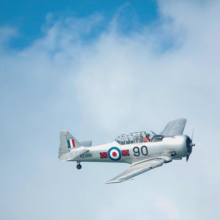 Historic aircrafts perform a fly over during the 77th Anniversary of the Bombing of Darwin special commemorative service in Darwin, Tuesday, February 19, 2019. (AAP Image/GLENN CAMPBELL) 