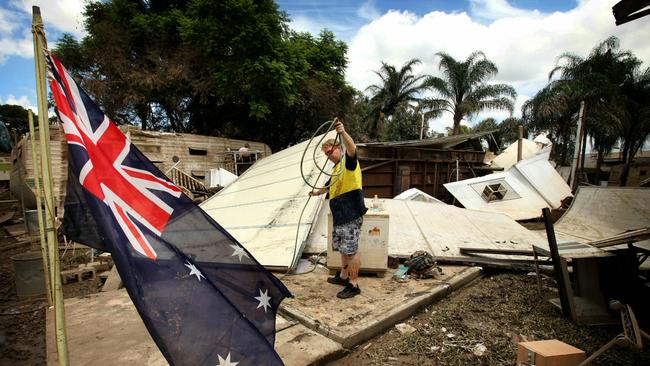 Stephen Tunny stands on the slab where his caravan once stood at Gailes Caravan Village in Gailes, Brisbane. The Gailes Caravan Village was totally inundated by the floodwaters.