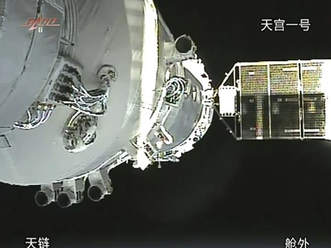In this image taken from China's CCTV via APTN, a video image show the docking of the Shenzhou 8 craft that was launched with the already orbiting Tiangong 1 module. Picture: AP