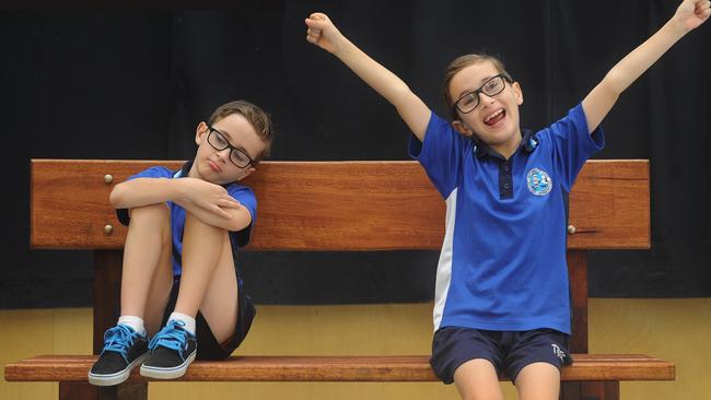 Charlie Cooper and the Buddy Bench at his school. Pic Brian Cassey