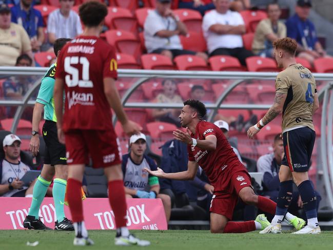 Ben Folami of Adelaide United appeals to the assistant official during the round seven A-League Men match between Newcastle Jets and Adelaide United at McDonald Jones Stadium, on December 07, 2024, in Newcastle, Australia. (Photo by Scott Gardiner/Getty Images)