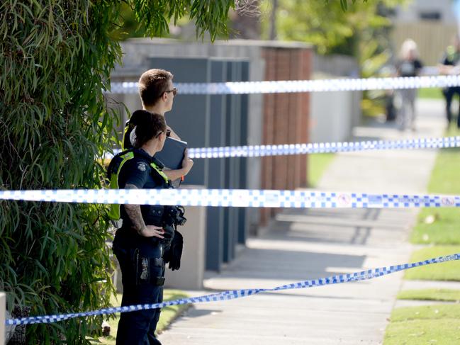 Police at the scene on James St in Mordialloc, where the pair was found dead. Picture: Andrew Henshaw