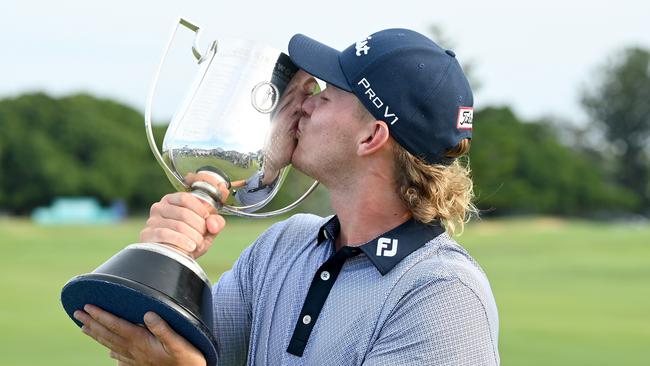 BRISBANE, AUSTRALIA - JANUARY 16: Jediah Morgan of Australia kisses the Kirkwood Cup as he celebrates victory during day four of the 2021 Australian PGA Championship at Royal Queensland Golf Club on January 16, 2022 in Brisbane, Australia. (Photo by Bradley Kanaris/Getty Images)