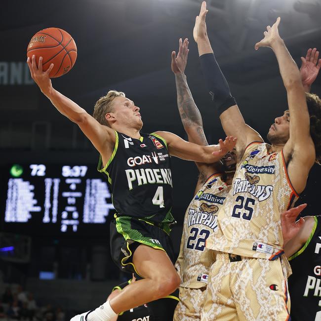 Kyle Adnam of the Phoenix drives to the basket.