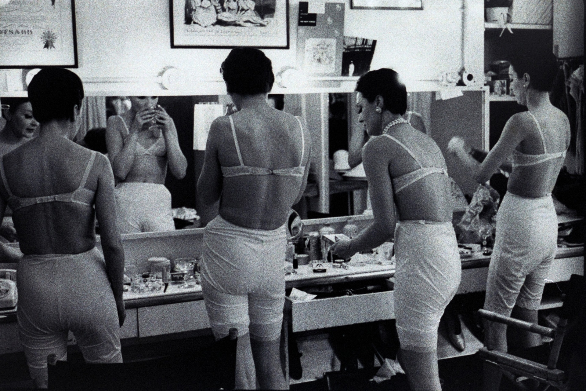 Models backstage at designer Norman Norell’s fashion show in 1963. Image credit: Condé Nast via Getty Images