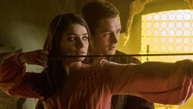 Eve Hewson and Taron Egerton in a scene from Robin Hood (2018). A StudioCanal Films release.