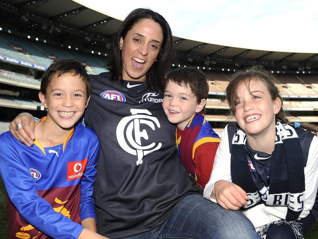 Nicole Livingstone with daughter Ella and sons Josh and Robinson Smith at the MCG.