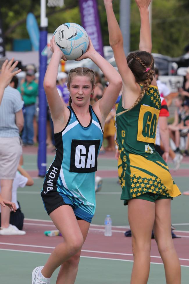 The Netball Qld Primary Schools Cup grand finals are being held at the Hinterland District Netball Association at Mudgeeraba. Homies (home schooled kids) player goal attack Annabel Wedgwood in action against against Gilston's Darcey Phelan. Picture: Mike Batterham.