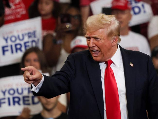 Former US President and 2024 Republican presidential candidate Donald Trump arrives to speak during a campaign rally at the Georgia State University Convocation Center in Atlanta, Georgia, on August 3, 2024. (Photo by CHRISTIAN MONTERROSA / AFP)