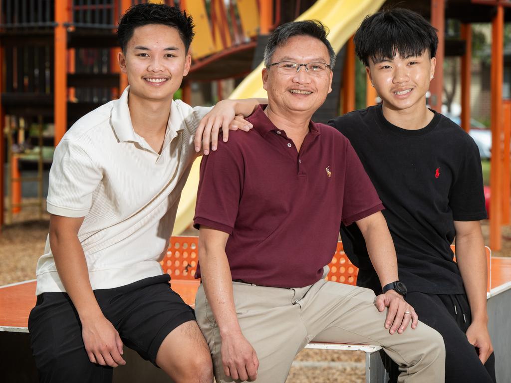 Stan Nguyen with his sons, Daniel, 20, and Aaron, 16, are happy to call Point Cook home. Picture: Tony Gough