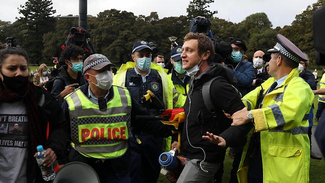 Black Lives Matter organiser Paddy Gibson is arrested for protesting in Sydney last week despite a ban. Picture: Jane Dempster