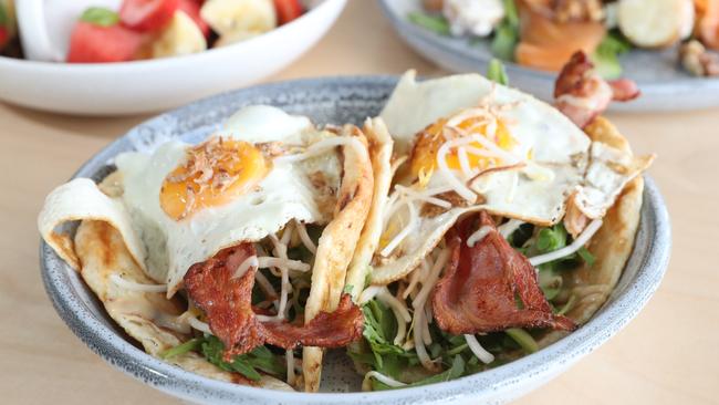 The popular bacon and egg Hawker Roll at Hymn Coffee. Photo by Richard Gosling