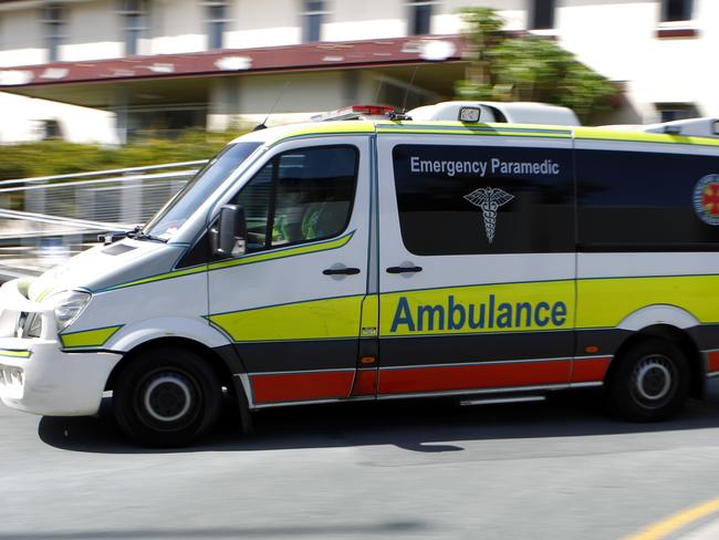 Ambulance and Hospital staff moving patients from the old Gold Coast Hospital at Southport to the new Gold Coast University Hospital