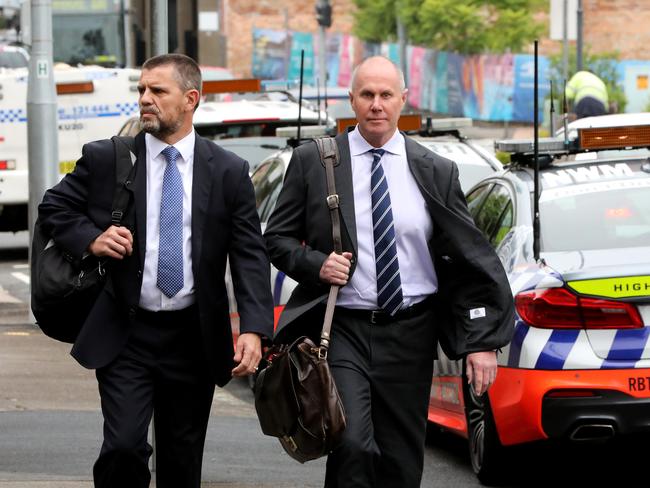 Channel 9 news chief Darren Wick pictured (right) arrives at Hornsby Local Court on Wednesday. Picture: NCA NewsWire / Damian Shaw