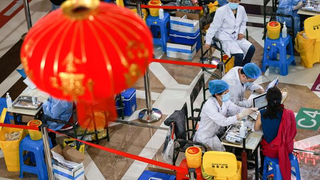 A resident receives the China National Biotec Group (CNBG) coronavirus vaccine in Shenyang, in China's northeastern Liaoning province. Picture: AFP