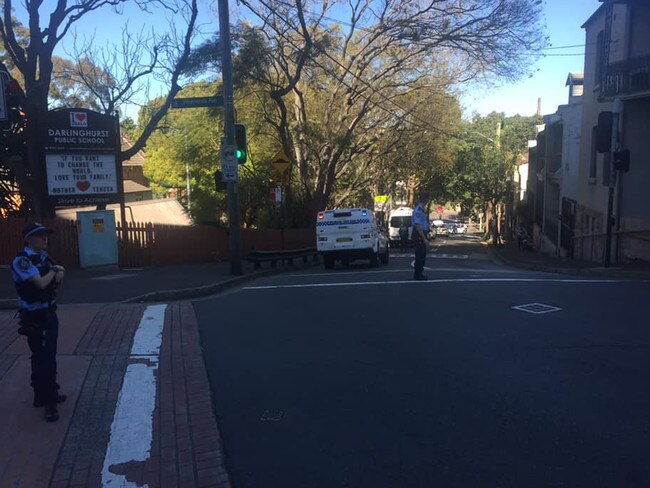 Police stand guard outside Darlinghurst Public School following a stabbing on Liverpool St on Wednesday, September 4. Picture: Supplied