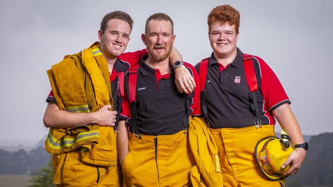 Darren Hardacre, centre, and his two sons Nathan, left, and Tim, right. Picture: Wayne Taylor