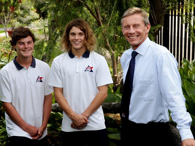 Balgowlah Boys High School principal Paul Sheather, pictured in 2016 with Julian Mckay 15, and Josh Smith 14, said the mobile phone ban would encourage students to talk to each other in the playground. Picture: Annika Enderborg