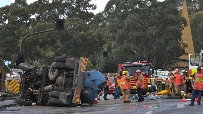 The Cleanaway truck at the bottom of the South East Freeway following the crash in 2014. Picture: Roger Wyman.