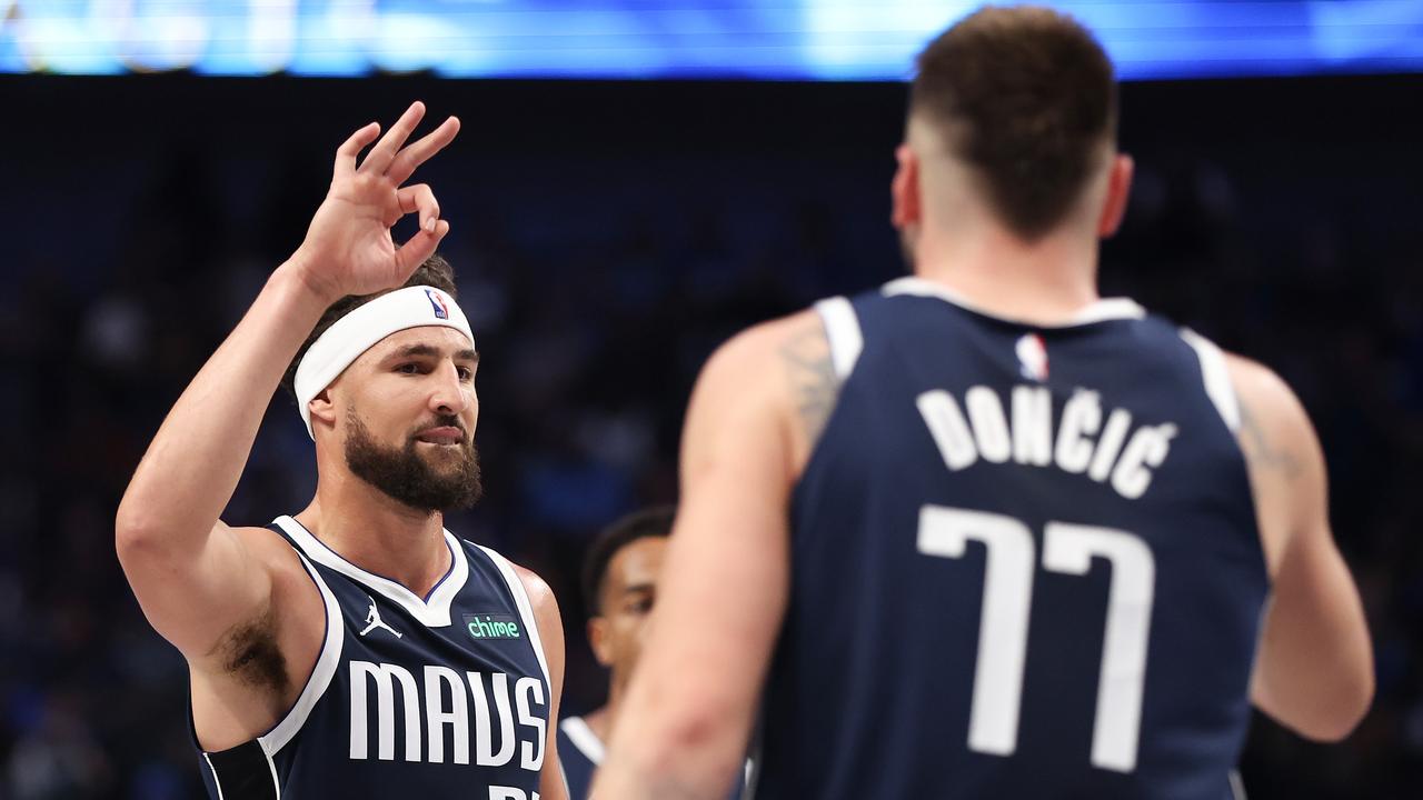 DALLAS, TEXAS - OCTOBER 24: Klay Thompson #31 of the Dallas Mavericks congratulates Luka Doncic #77 on his three-point basket against the San Antonio Spurs during the third quarter at American Airlines Center on October 24, 2024 in Dallas, Texas. NOTE TO USER: User expressly acknowledges and agrees that, by downloading and or using this photograph, User is consenting to the terms and conditions of the Getty Images License Agreement. (Photo by Sam Hodde/Getty Images)