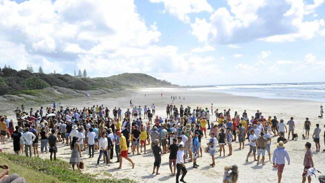 GRIEF AND TRAUMA: There was a large turnout at Shelly Beach for the memorial service of local surfer Tadashi Nakahara, who died in a shark attack at the popular surfing spot on February 9, 2015. Picture: Marc Stapelberg