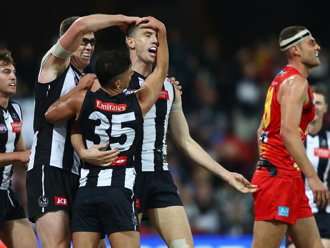 GOLD COAST, AUSTRALIA - JULY 01: Darcy Cameron of the Magpies celebrates a goal during the round 16 AFL match between Gold Coast Suns and Collingwood Magpies at Heritage Bank Stadium, on July 01, 2023, in Gold Coast, Australia. (Photo by Chris Hyde/AFL Photos/via Getty Images)