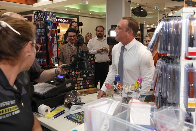 Queensland State Election coverage with the Queensland Premier Steven Miles. Steven visits Caneland Central where Scott Mauchline from Mister Minit cleans the Premiers shoes. Pics Adam Head