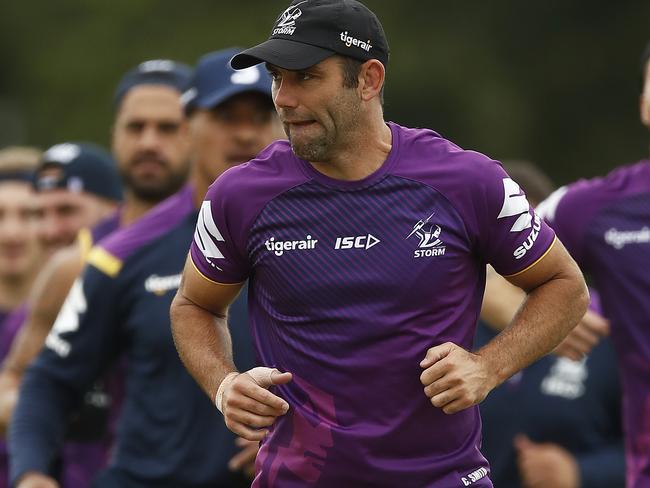 MELBOURNE, AUSTRALIA - MARCH 18: Cameron Smith (C) in action during a Melbourne Storm NRL training session at Gosch's Paddock on March 18, 2020 in Melbourne, Australia. (Photo by Daniel Pockett/Getty Images)