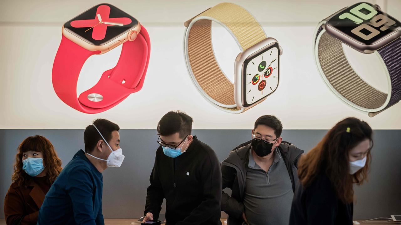 Apple stores in China, including this one in Beijing, reopened this week. Picture: Nicolas Asfouri / AFP