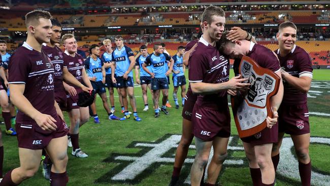 Sam Walker hugs captain Joshua James after the win. Picture: Adam Head
