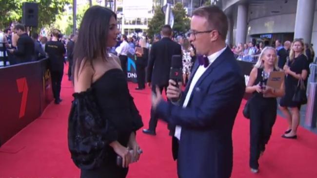 Silvia Colloca reveals to Jonathon Moran that she is five months pregnant on the red carpet at the 2016 AACTA Awards at The Star in Sydney.