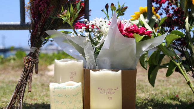 Bunches of flowers and tributes continue to amount at the memorial site in the Broadwater Parklands on the Gold Coast. Picture: NCA NewsWire / David Clark