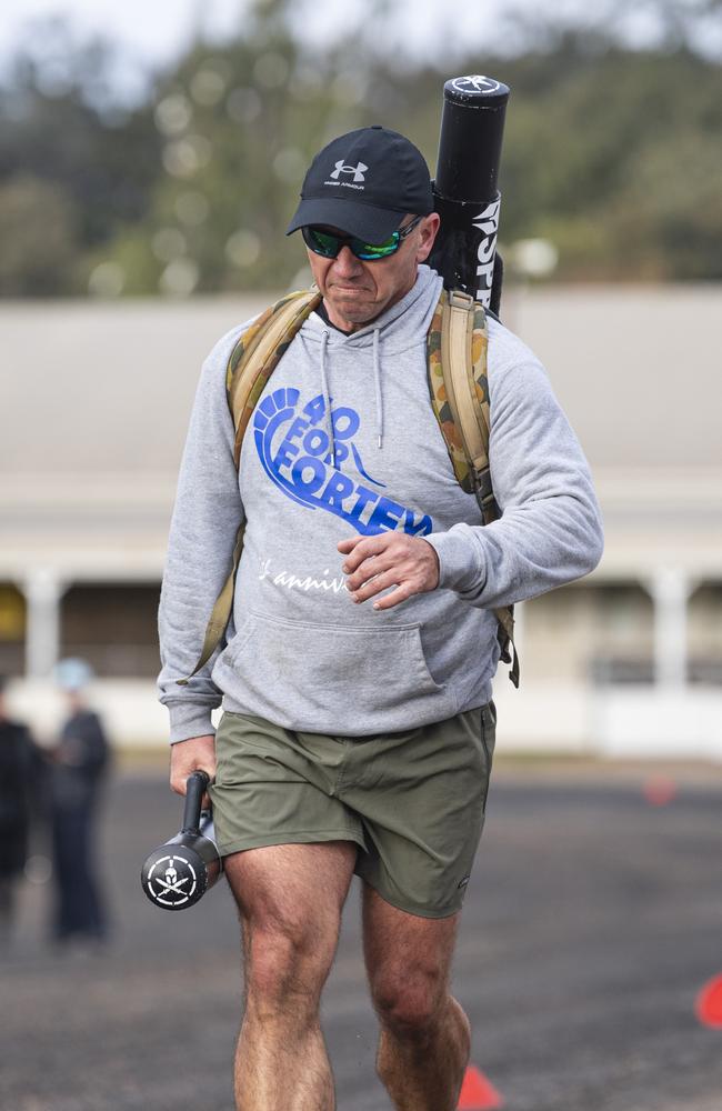 Spartans team member Geordie Horn (carrying an extra 40kg) in 40 for Fortey at Toowoomba Showgrounds, Sunday, June 2, 2024. Picture: Kevin Farmer