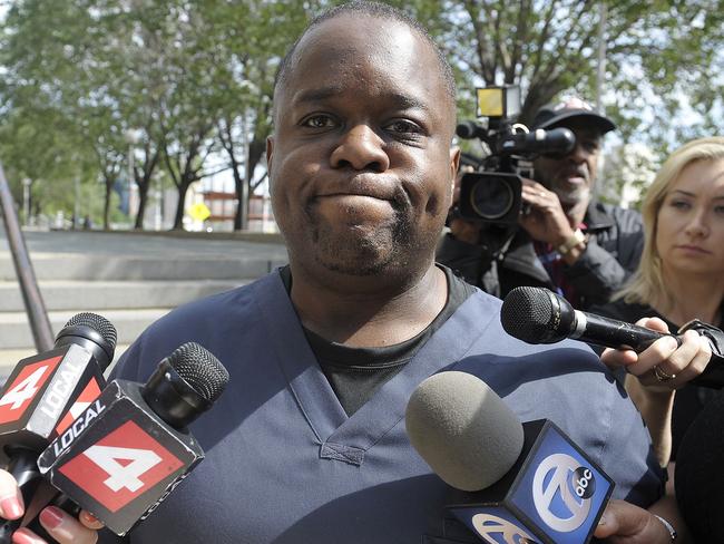 Denies abusing his son: Charlie Bothuell IV. AP Photo/Detroit News, Clarence Tabb Jr.