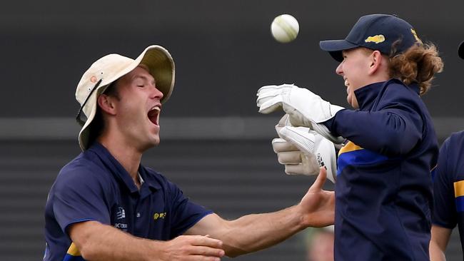 Ringwood’s Patrick Ashton and Josh Hartill celebrate a wicket earlier this season. Picture: Andy Brownbill