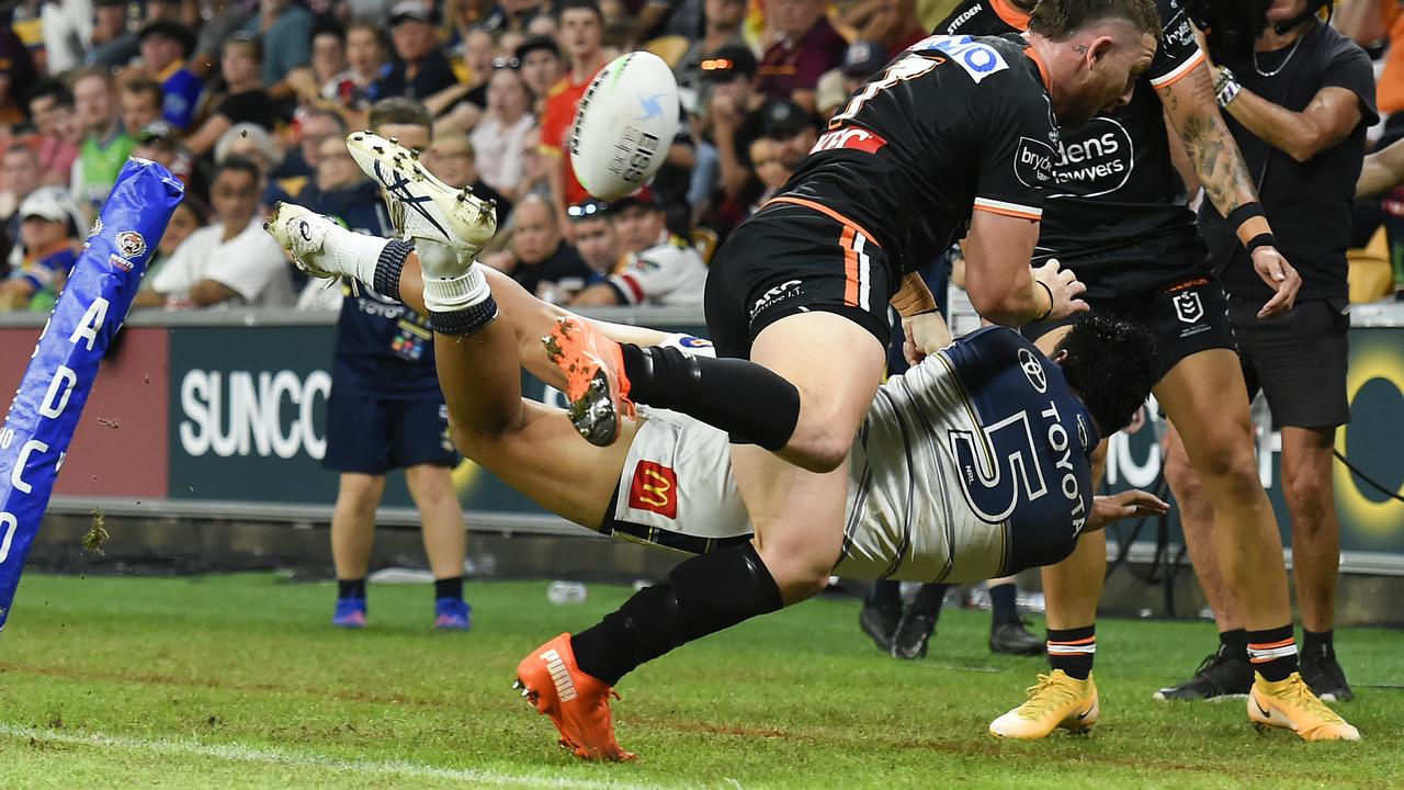 Murray Taulagi set up one of the tries of the season, coming up with an incredible pass while completely above the sideline. Picture: Getty Images.