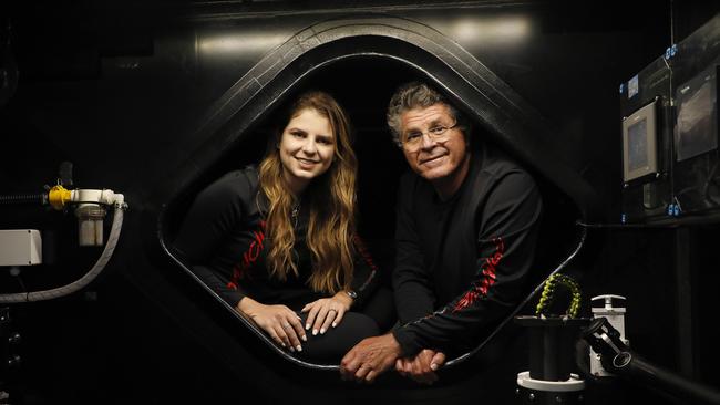 Last year's line honours winner Comanche with owner/skipper Jim Cooney with his daughter Julia in the Balast pumping section. Picture by Chris Pavlich for The Australian