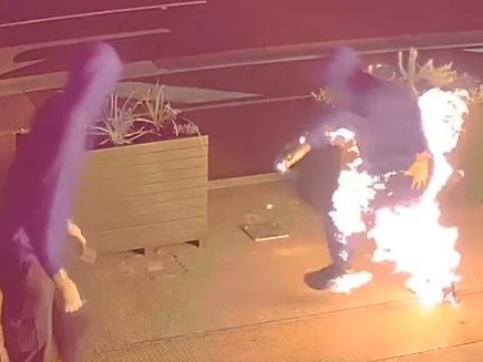 CCTV footage has captured the moment a bumbling arsonist set their pants on fire in an attempted attack on a fast food restaurant in Doncaster East on Christmas morning. Picture: VicPol