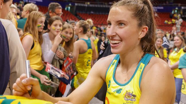 Amy Parmenter of Australia signs autographs after game two of the International Test series between the Australia Diamonds and the England Roses. Photo: Getty Images